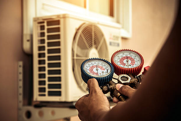 Professional Air Conditioning Service technician working in Springfield, GA